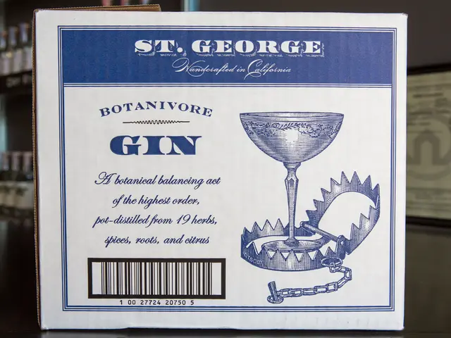 In the picture there is a poster with the text, behind there are many bottles present on the...