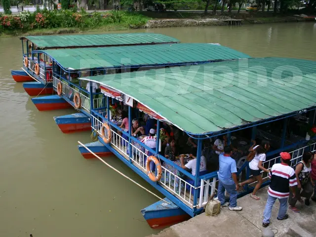 In this image on the water body there is a boat. Inside the boat there are many people. These are...